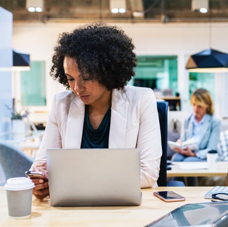 Person managing finances to stay out of debt