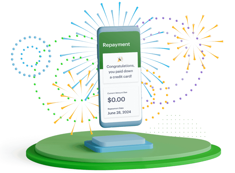 Fireworks and a phone displaying zero dollars due on a loan