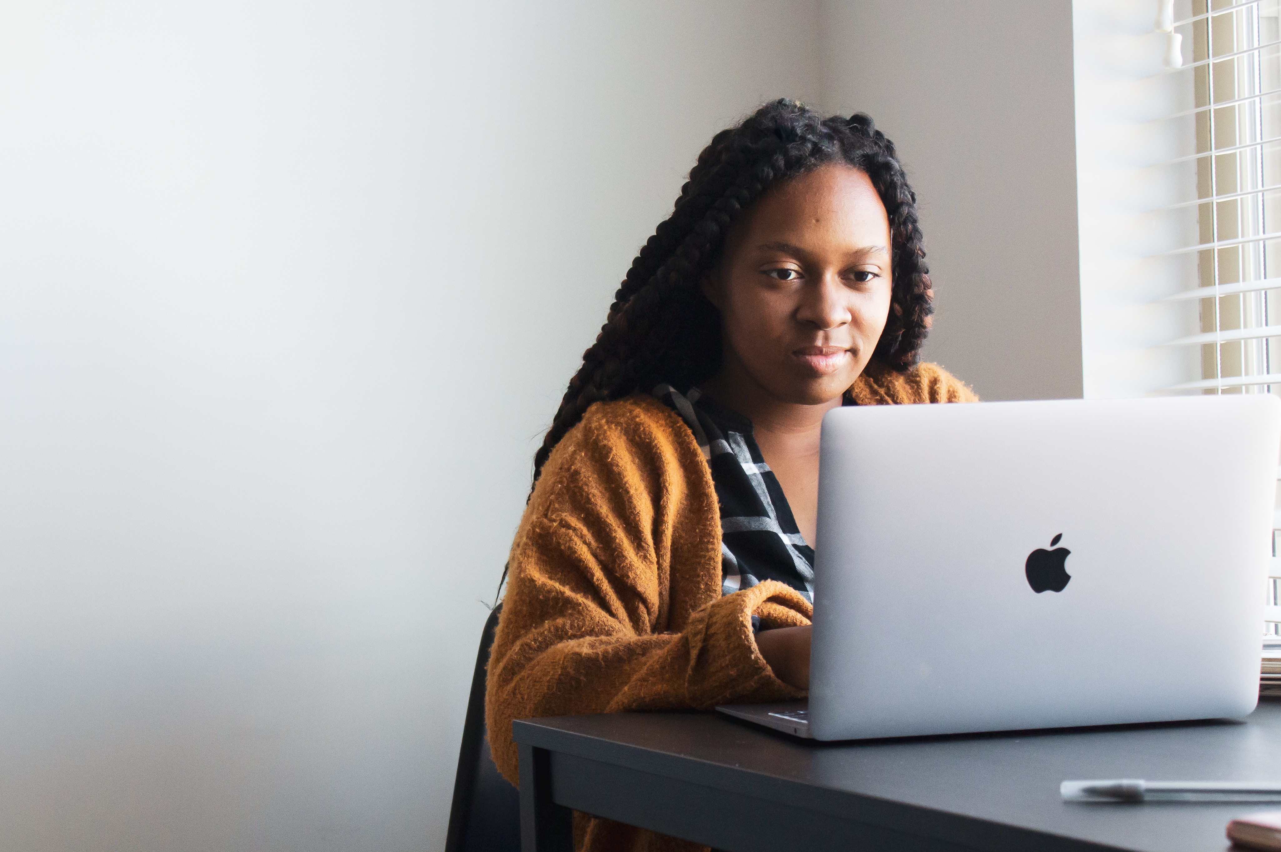 woman on laptop doing research